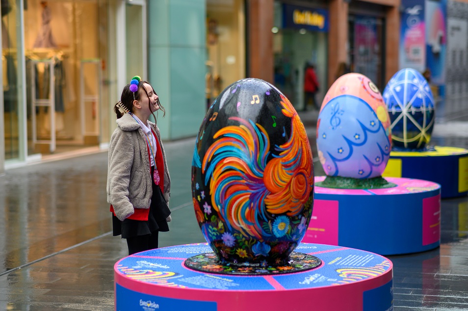 A child looks at the Psyanka egg display in Liverpool One as part of Eurovision celebrations