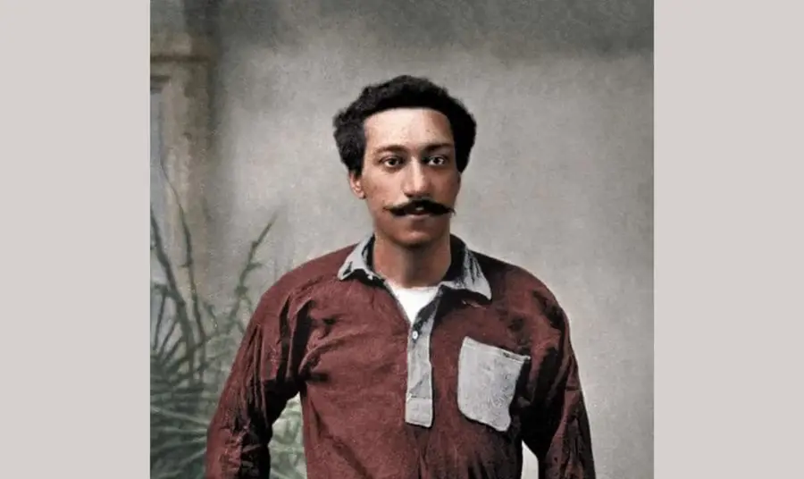 a historical photograph of a black man wearing sportswear