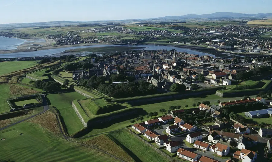 An aerial view of the ramparts showing Berwick town and the sea beyond