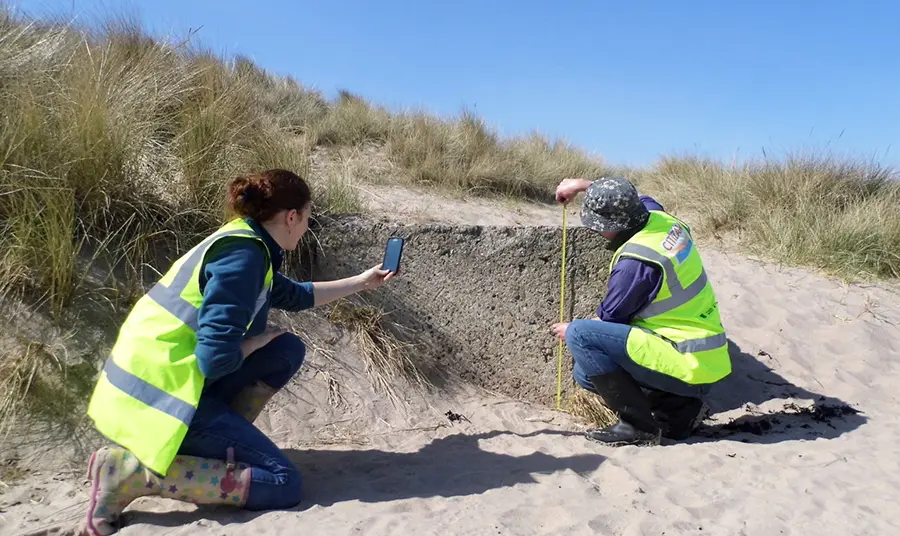 CITIZAN volunteers measuring on a beach