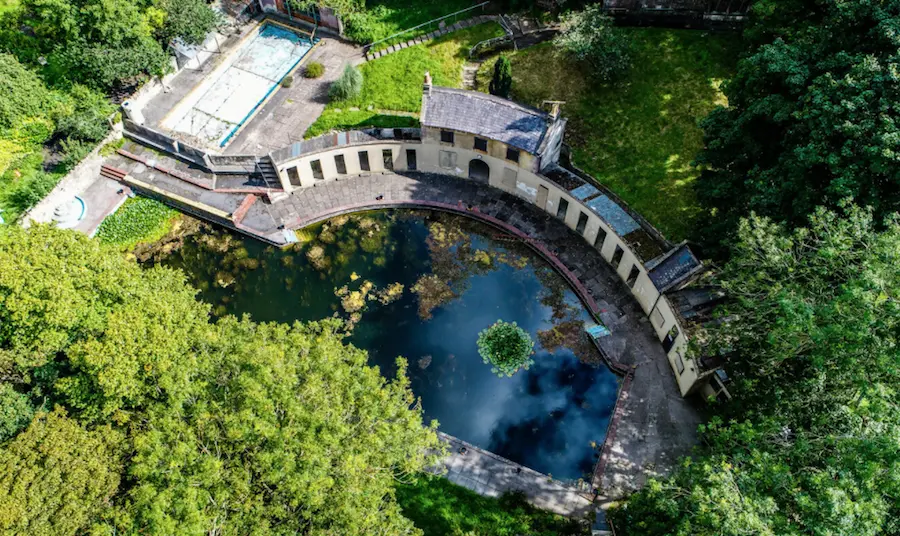 An aerial view of the crescent-shaped Cleveland Pools. A Georgian lido in Bath