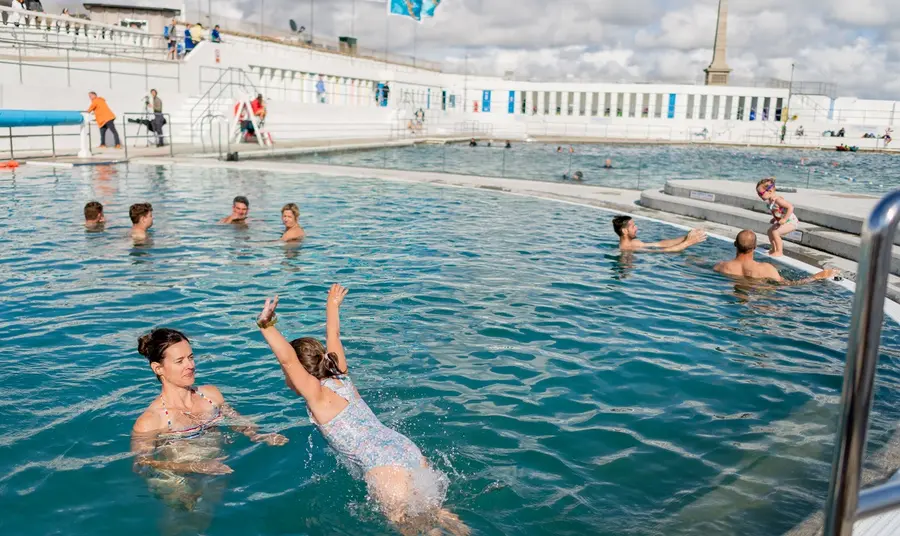 People swimming and playing in the Jubilee Pool