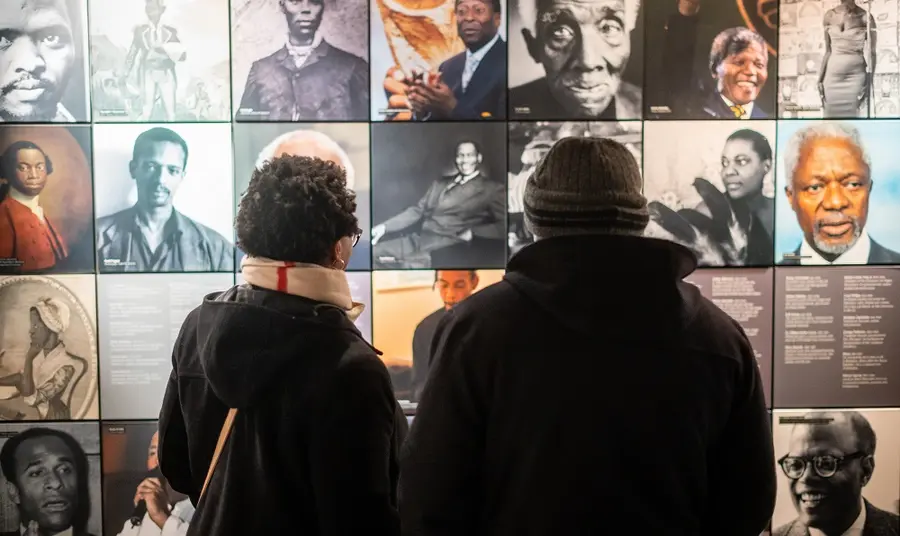 People viewing an exhibition at the International Slavery Museum