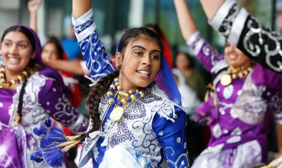 People dancing as part of a cultural festival at the Birmingham Commonwealth games