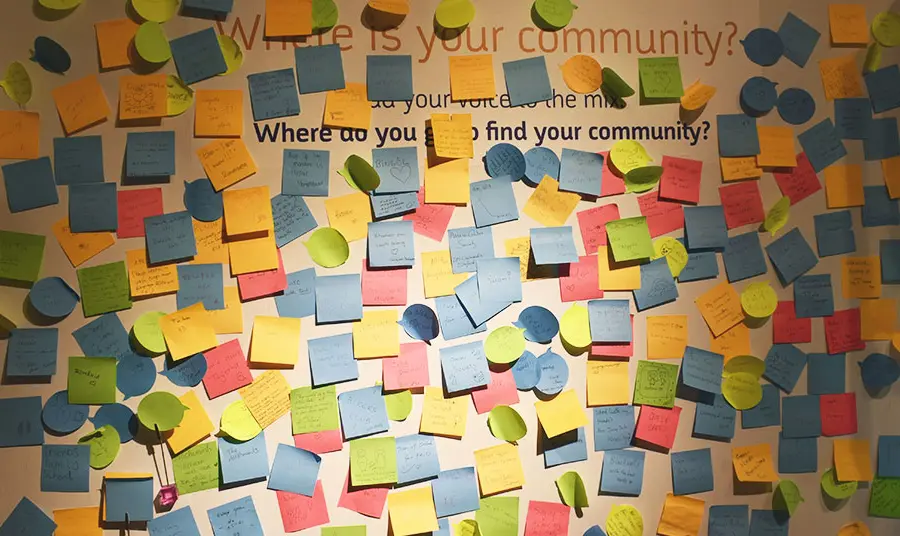 Museum of Oxford's Queering Spires exhibiton. Display post it notes with comments and memories from visitors.