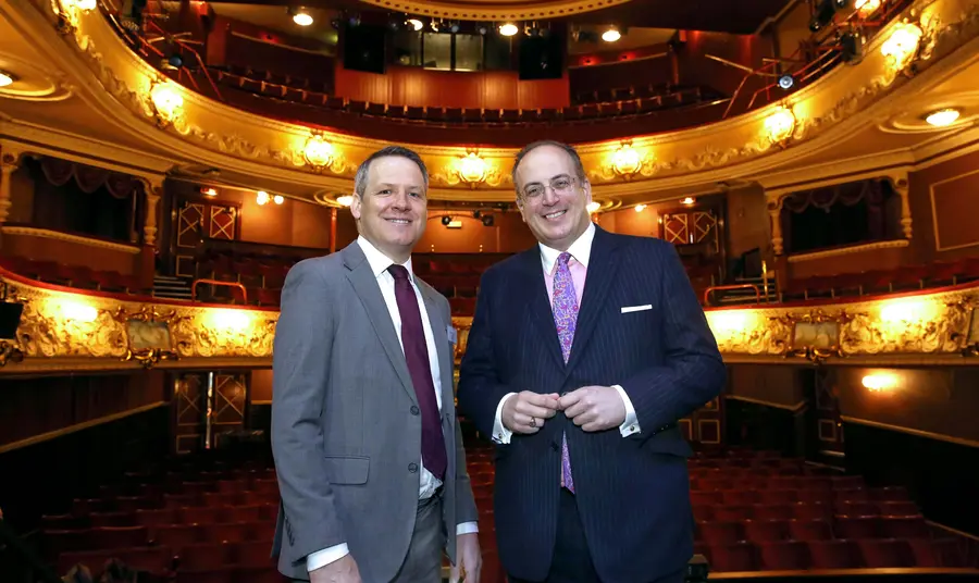 Two men in a theatre