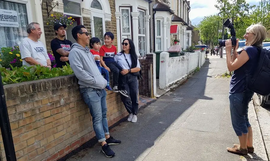 Newham family being photographed during Newham Heritage Month