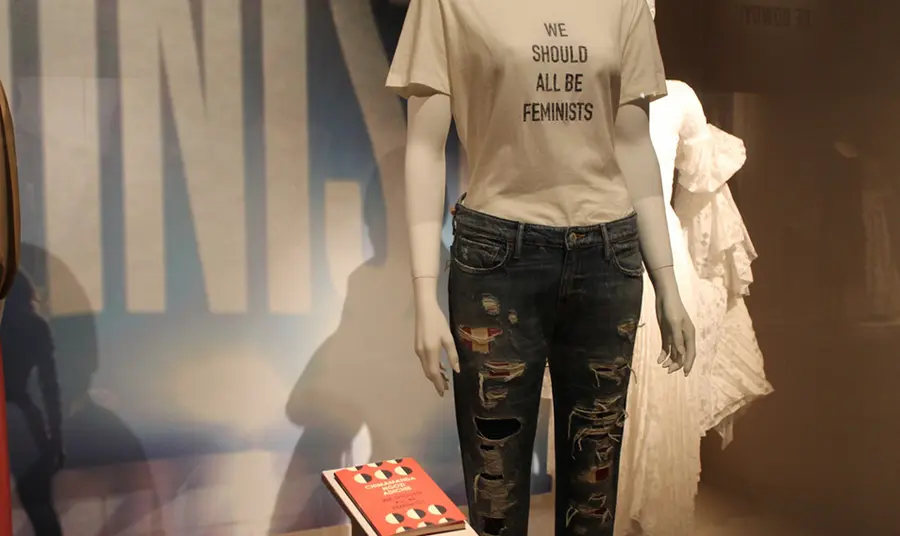 A mannequin in a T-shirt saying 'we should all be feminists'