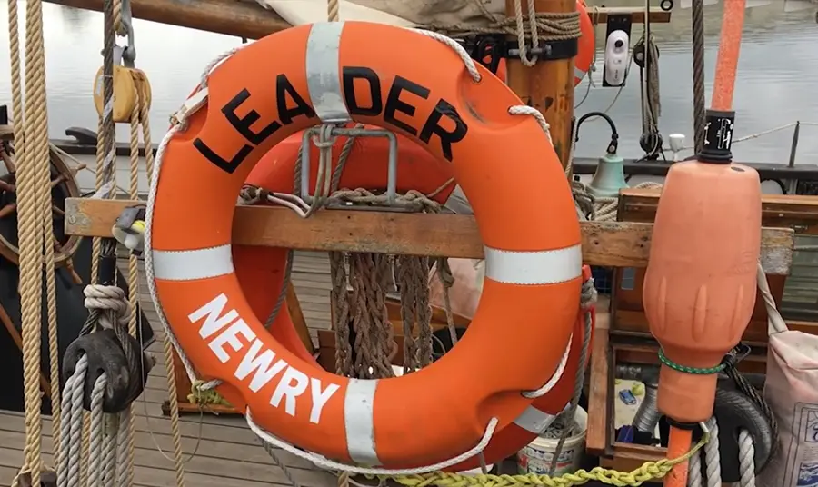 A lifebouy with Leader, Newry written on it, attached to the ship