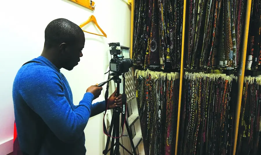A participant photographing wax prints