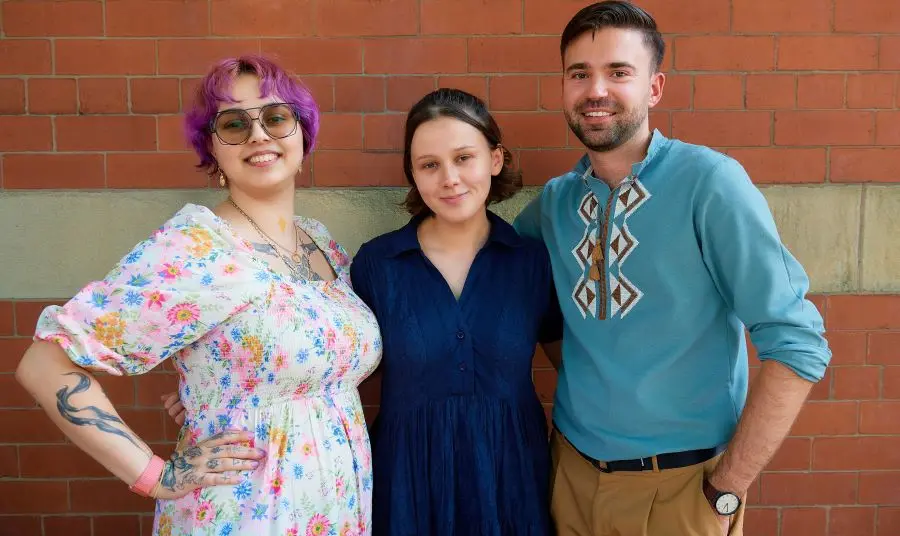 Three people working on the Roma Heritage Project.