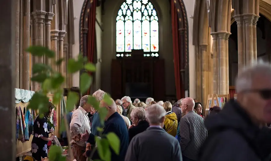 People look at stalls at a craft fair inside St Peter's Sudbury