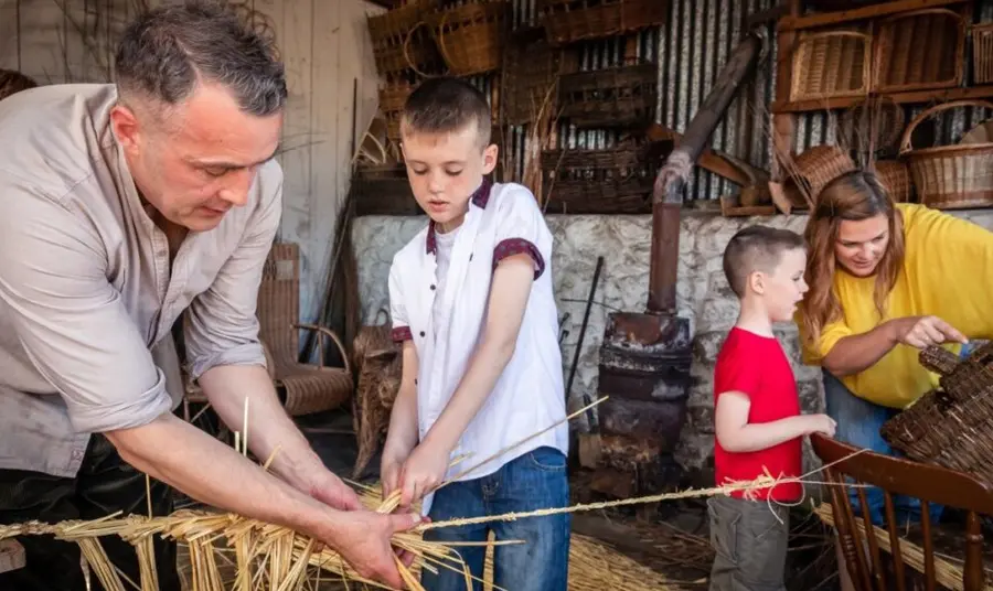 Children and adults take part in traditional heritage crafts