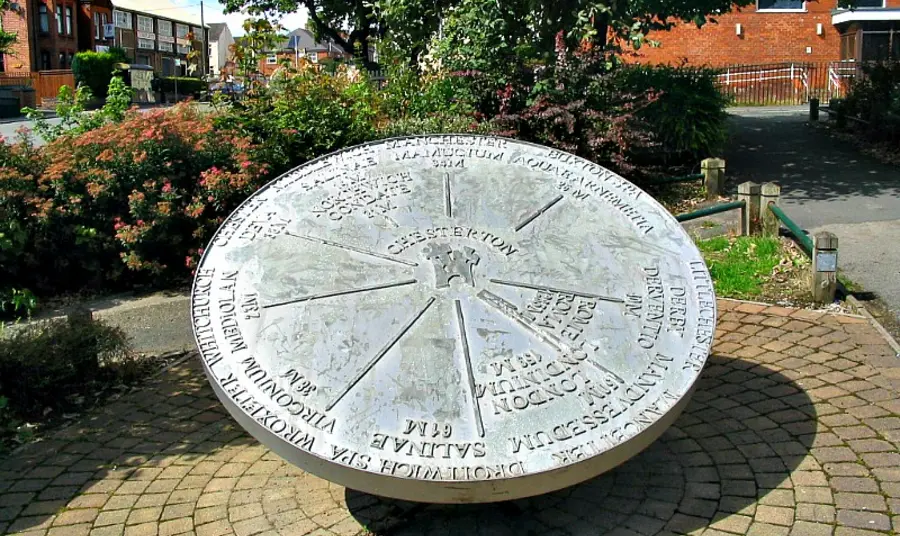 Stone dial indicating distances to various places from Chesterton