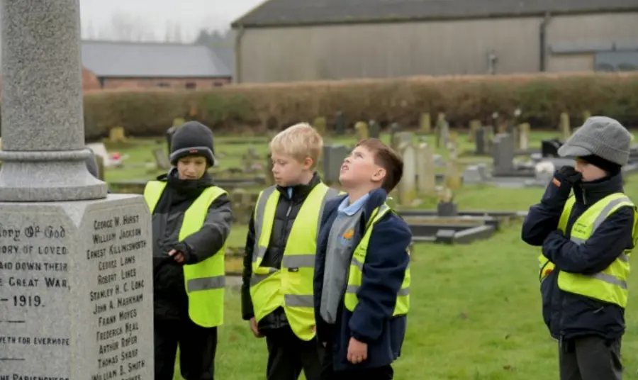 Children deep in their research at Emneth War Memorial