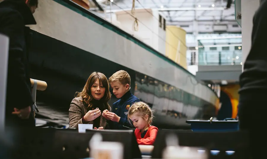 A family enjoys Discovery Museum