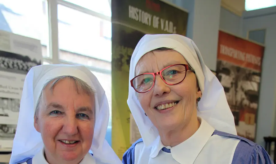 Anne Wall and Eileen Brereton in costume as First World War Red Cross nurses