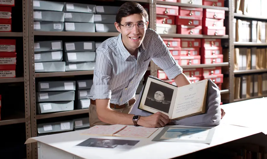 Matthew with a play script in the Peter Brook archive 