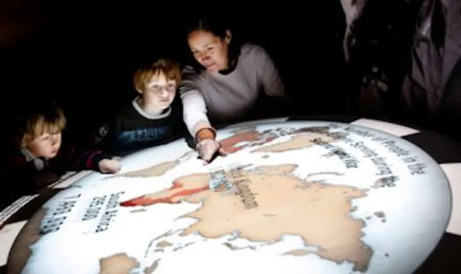 Children examine an exhibit at the National Army Museum