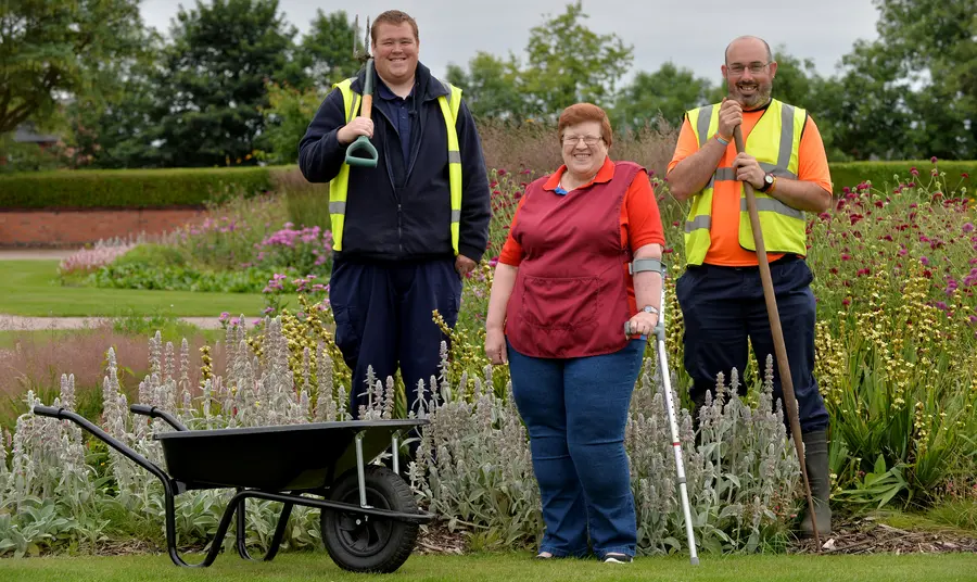 Tom Emery, Patricia Roberts and Matt Bateman, volunteers at Burslem Park