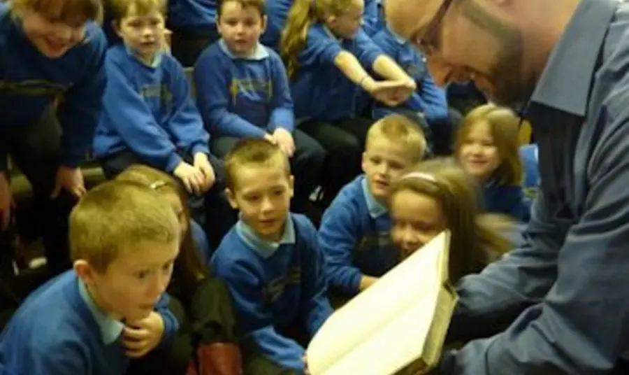 Children participating in learning activities with The Scottish Council on Archive
