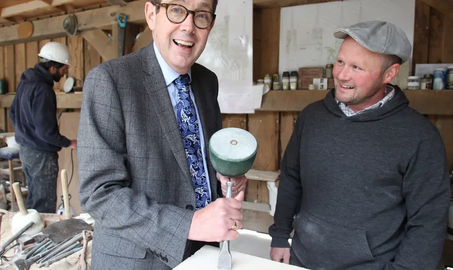 Sir Peter Luff with an apprentice stonemason