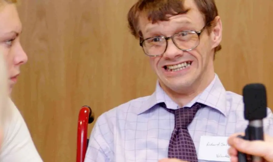 Disabled volunteers interviewing people with cerebral palsy