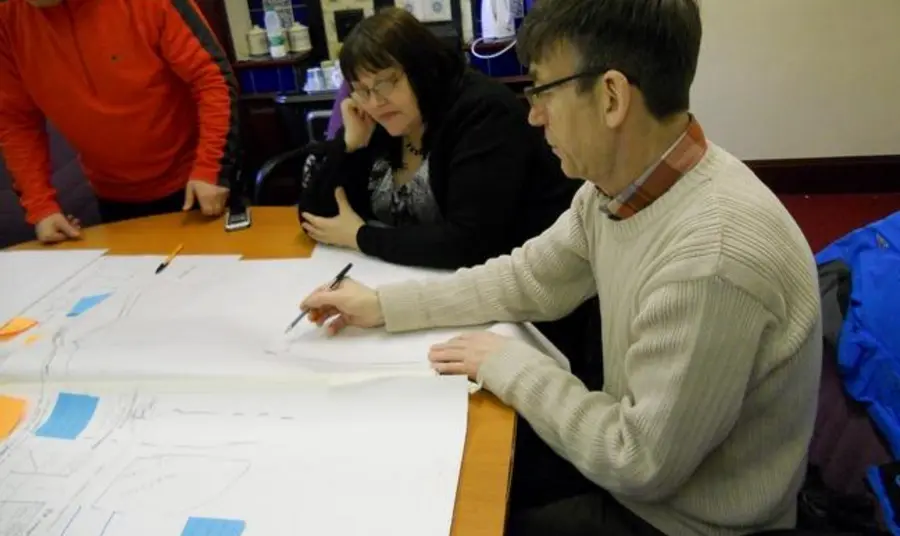 Our Histories participants working on their personal stories and poems