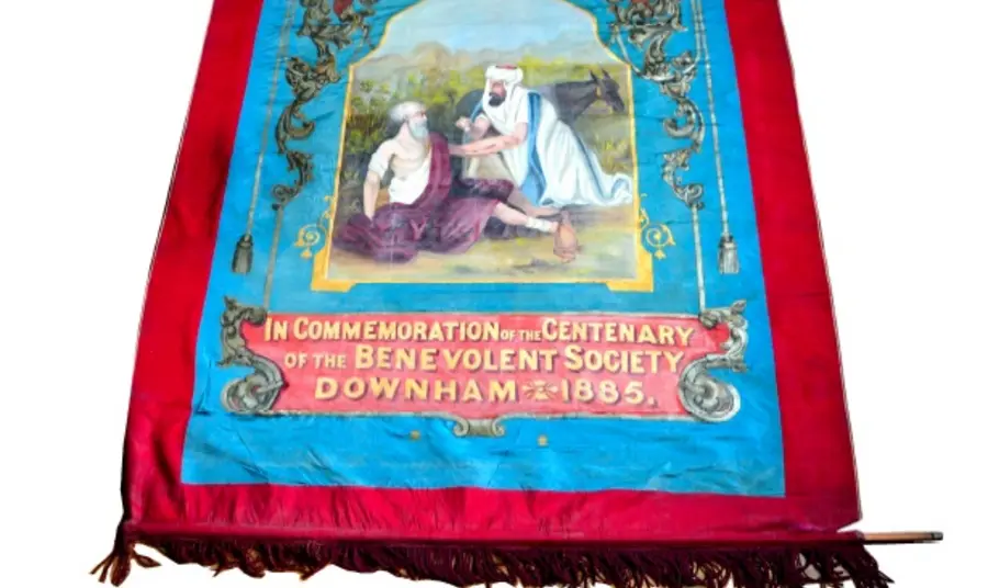 The banner in need of repair and conservation