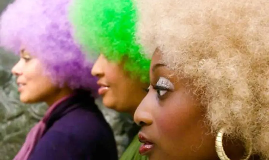 Women proudly wearing their diverse wigs