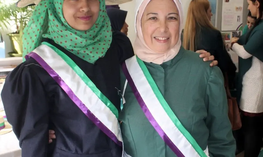 Participants dressed up as suffragettes during a project event