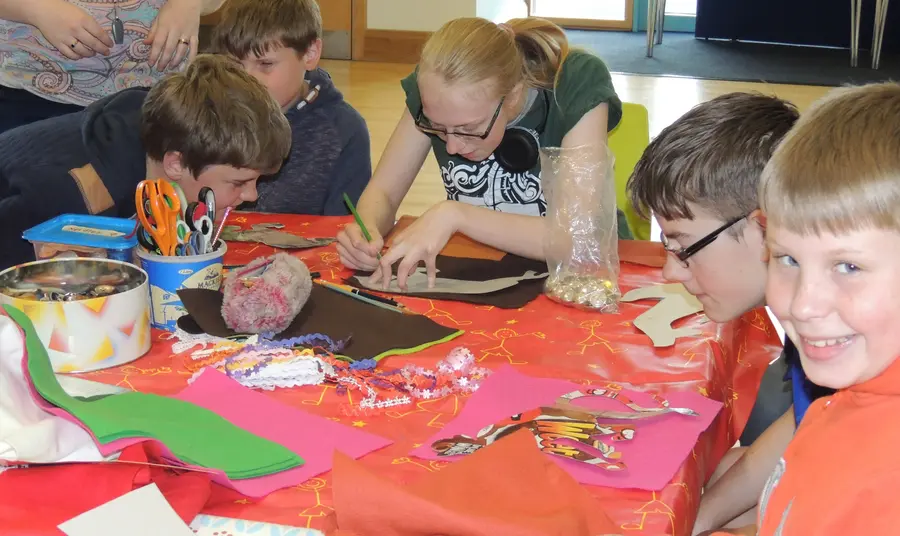 Members of Sight Support Derbyshire creating a tactile banner