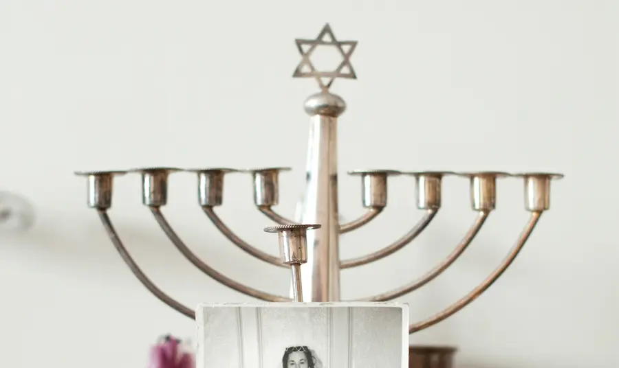 A menorah and wedding photograph from the Let The Elders Speak project.
