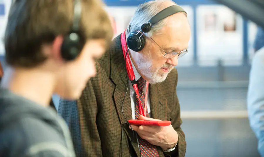 Visitors listening to the audio tour at the John Galsworthy exhibition
