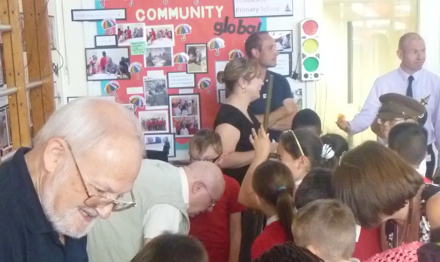 Volunteers from the Western Front Association share stories and artefacts with primary school children