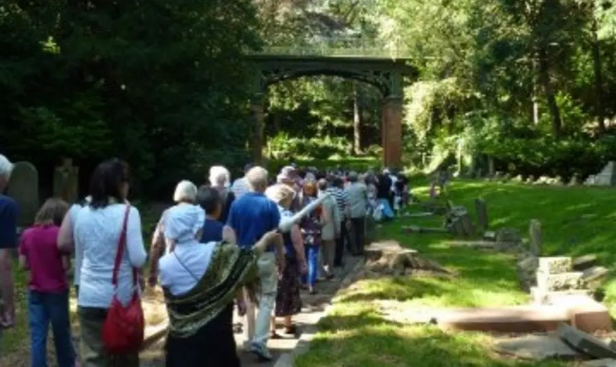 People on a guided walk to the Secret Garden