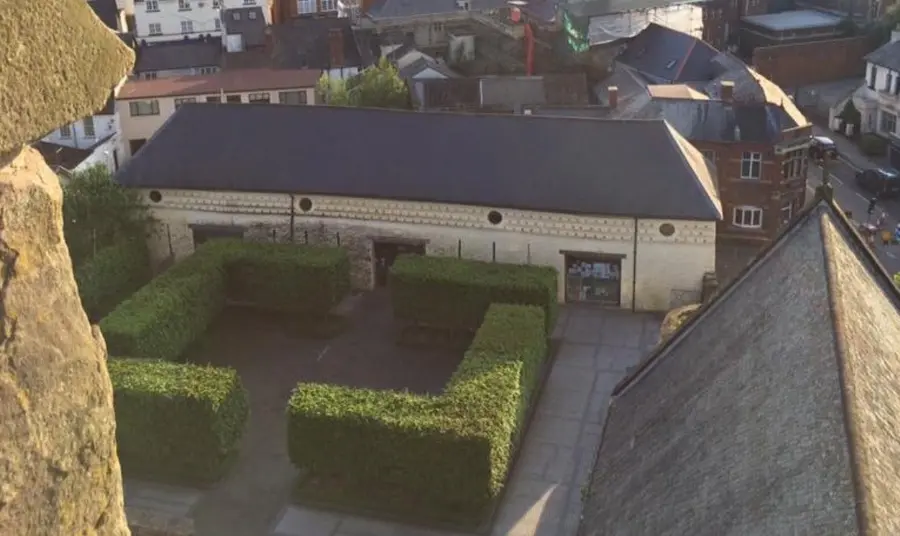 The restored Tithe Barn and courtyard in Monmouthshire, Wales.