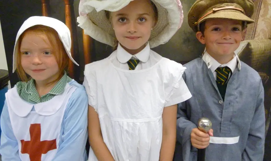 Children in First World War costumes at The Museum of Somerset