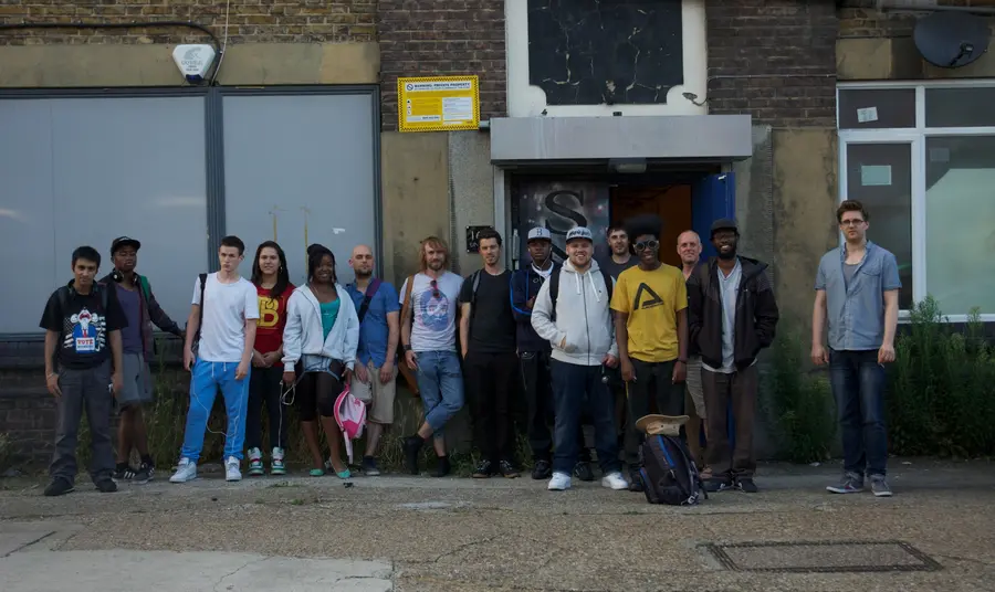 Young people involved in the project stand outside the studio