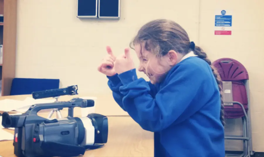 A young Traveller filming stories