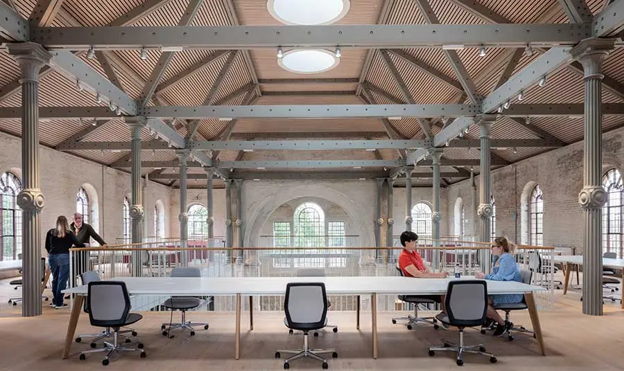 Interior view of the restored Sheerness Dockyard, including seating and office space