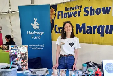 Engagement Manager Shanna Lennon standing at a stall in Knowsley