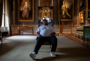 Big Narstie sitting in Kenwood House