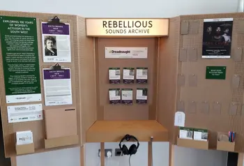 Display with headphones to access the Rebellious Sound Archive