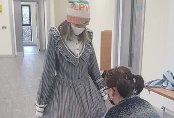 Person getting costume fitted