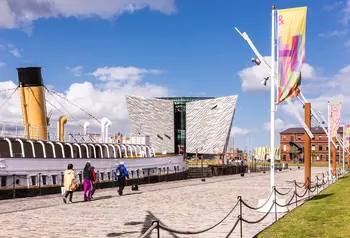 Ss Nomadic ship and Titanic Belfast building in background.