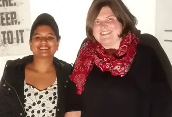 Two women at queer exhibition