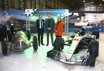 Prince Harry turns the start lights green with HLF's Sir Peter Luff and Silverstone's Sally Reynolds