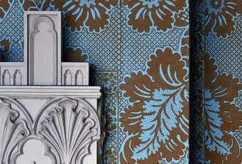 Wallpaper and fireplace in Mr Walpole's bedchamber