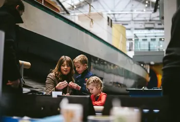 A family enjoys Discovery Museum